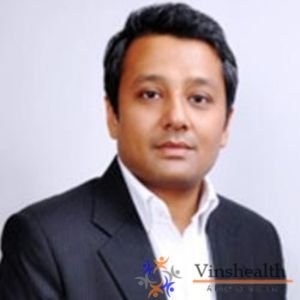 Dr. Anupam Sinha, Dentist in Delhi - Expert Care and Compassionate Treatment